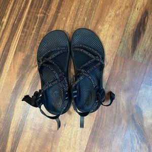 Black and white speck chacos